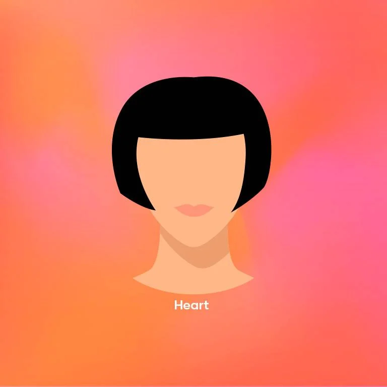 The heart face shape is characterized by a wider forehead and cheekbones with a narrow chin. A bob hairstyle is the perfect way to flatter this face shape by drawing attention to the chin and jawline. This bob, with its side-swept bangs and subtle layers, frames the face beautifully and accentuates the cheekbones.