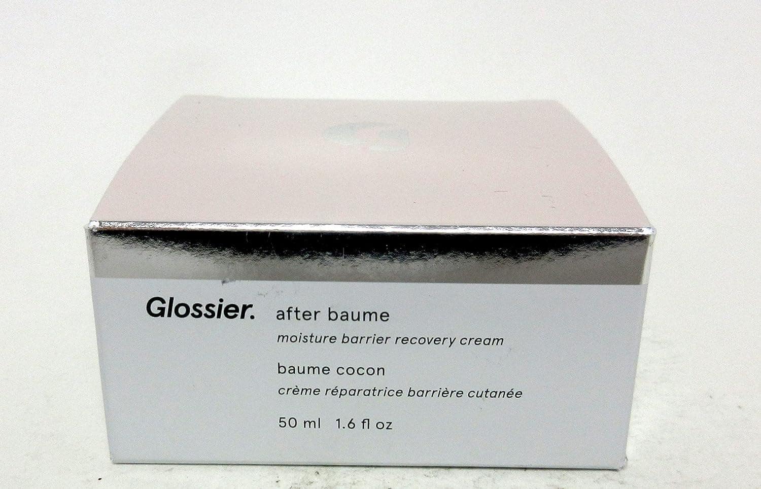 Glossier's After Baume-Your Skin's Essential Puffer Jacket for Winter Skincare, Ideal for Dry and Sensitive Skin.