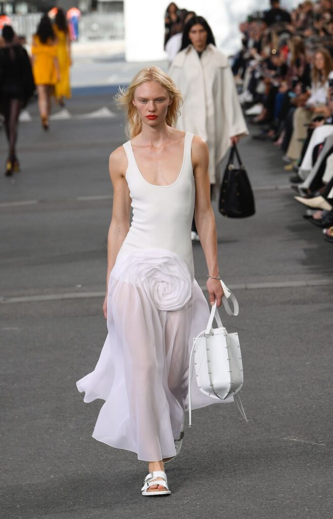 Model holding white color Stylish Bucket Bag