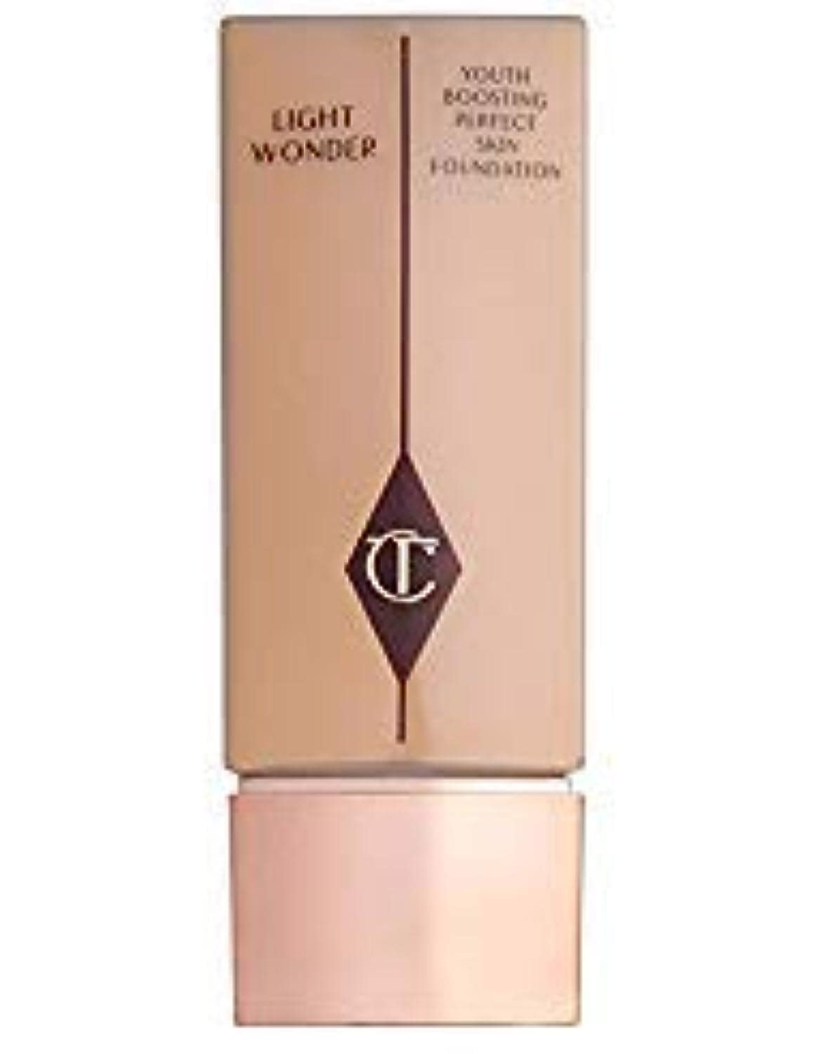 Charlotte Tilbury's Light Wonder Foundation shade offers weightless, sheer coverage with an adaptable shade range, though a higher SPF and expanded shade options would enhance its appeal.