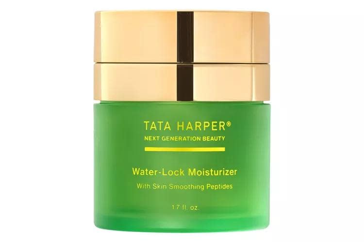 Oil-Free Moisturizer lifestyle, Tata Harper's Water-Lock Moisturizer, with its lightweight formula and natural ingredients like pomegranate spheres, orange blossom peptides, and hyaluronic acid, not only locks in moisture but doubles as a primer.