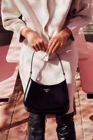 I personally fell for the allure of designer handbags, particularly the viral sensation of the Prada Cleo bag. Its enduring popularity, coupled with the iconic Prada logo, makes it a dual delight