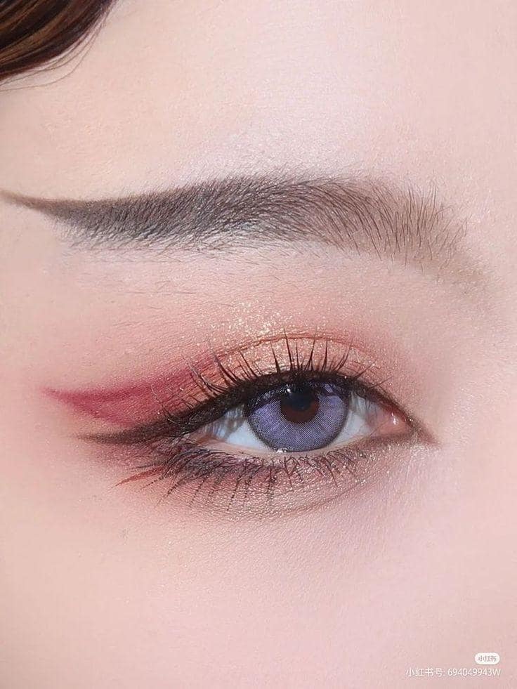 Starting my eye makeup, I apply a bit of foundation or concealer on the eyelids for a primer. For an intense Korean look, consider using eyeshadow primer.